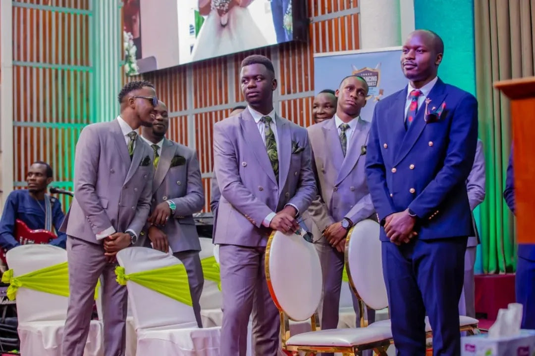 Glamorous Purple Double Breasted Peaked Lapel Wedding Groomsmen Suits